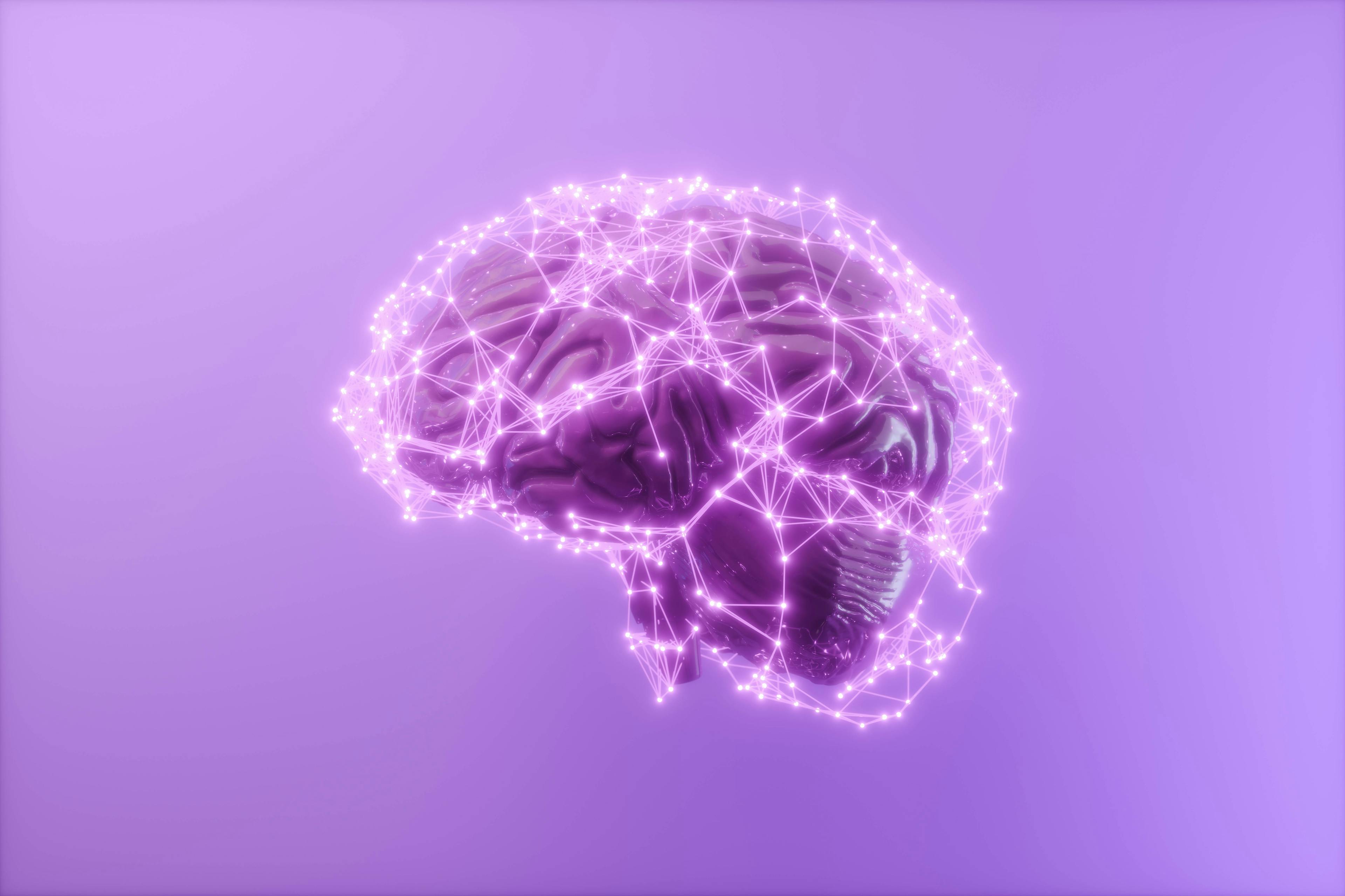 A human brain covered in purple digital dots and lines